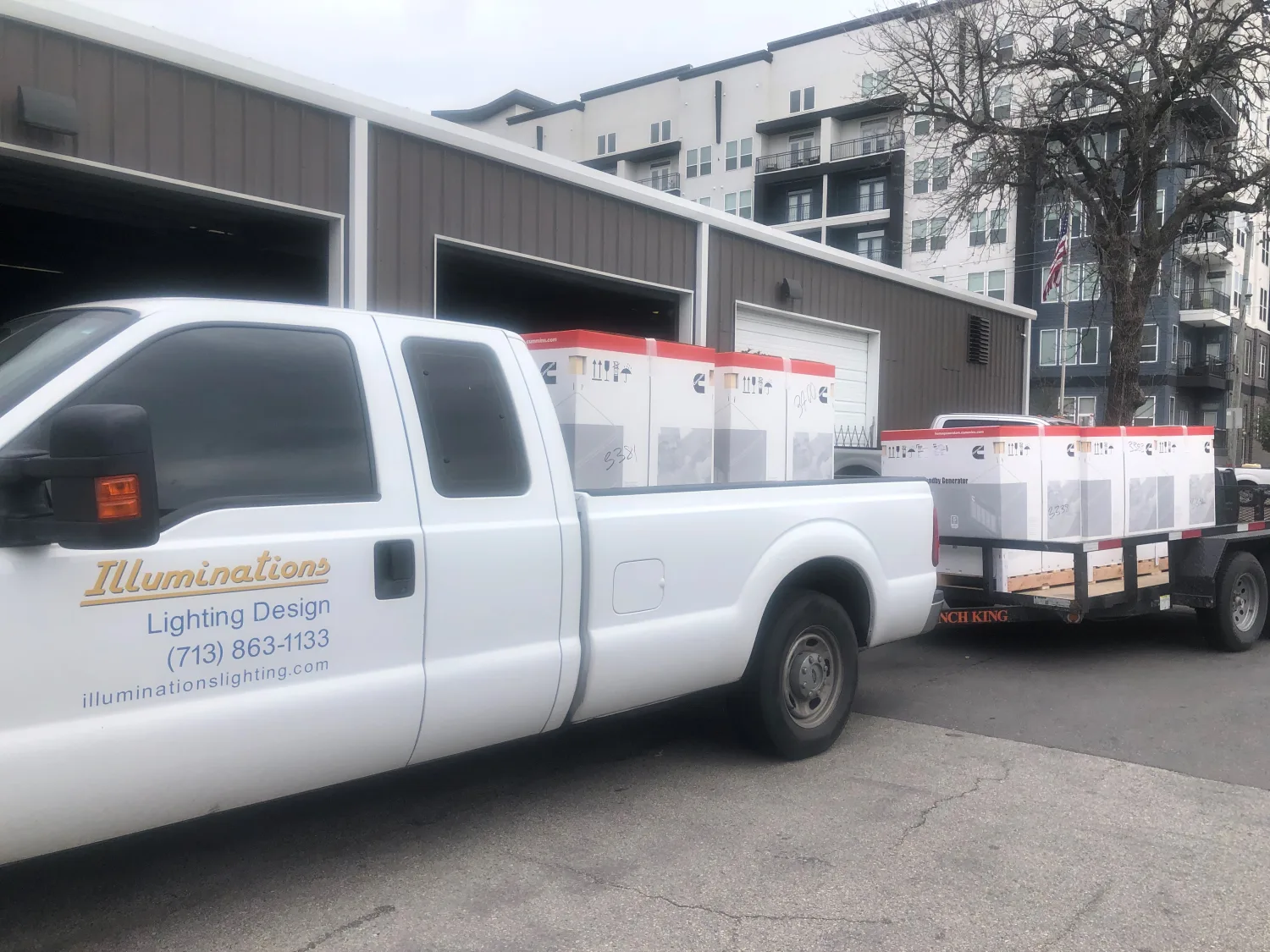 Illuminations Lighting Design truck loaded with equipment at a Houston job site